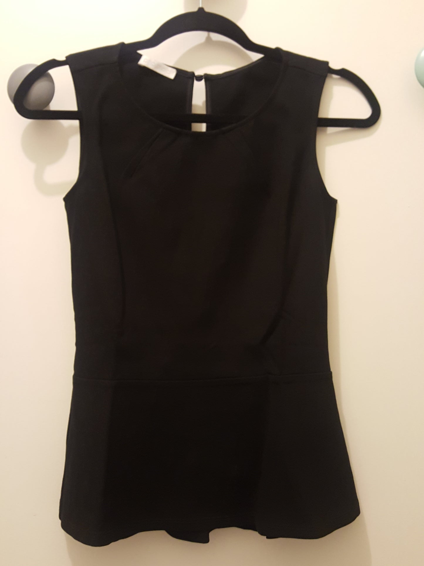 Top sans Manches Style Peplum "Promod"